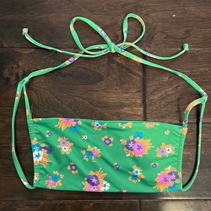 Super cute green bikini top. It is brand new never worn but with no tags.